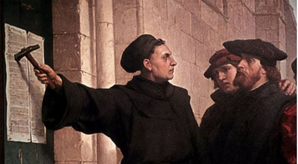 Représentation de Luther placardant ses 95 théses sur la porte de l'église de Wittemberg.